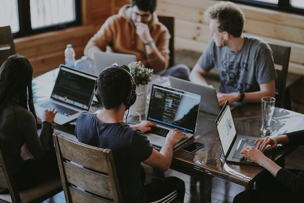 group of people working on computers